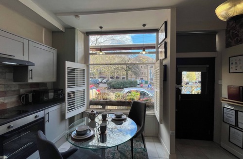 Wadsworth Apartment | Accessible Quiet Studio in Prime Central Location with Log Burner &Private Patio