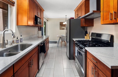 Meadowbrook House | Acclaimed 4BR Modern Eclectic Great Patio & Yard Pet Friendly