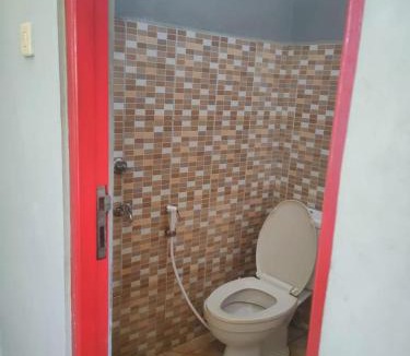 Palangkaraya Hotel | Adihan Homestay Mitra RedDoorz