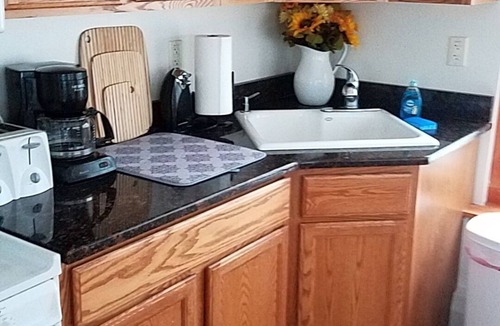 Ellenburg Center Apartment | Adirondack Hideout, lakefront location and sandy shoreline