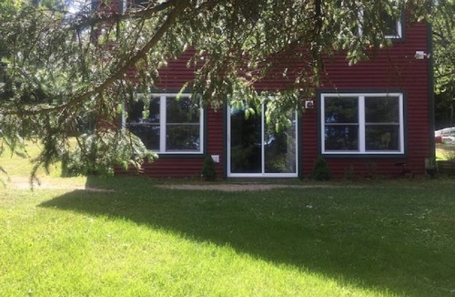 Ellenburg Center Apartment | Adirondack Hideout, lakefront location and sandy shoreline