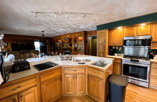 Town of Webb House | ADK Channel House - Spacious, waterfront home. Huge boathouse with top sun deck