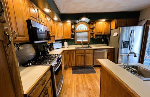 Town of Webb House | ADK Channel House - Spacious, waterfront home. Huge boathouse with top sun deck