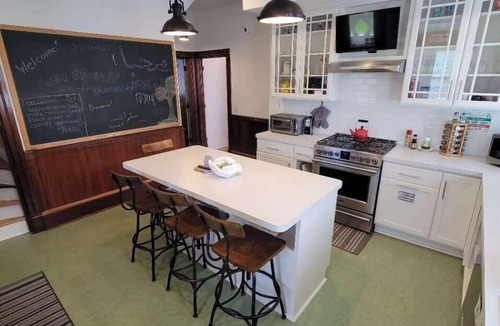 West Washington House | Adler House: A charming South Bend escape. - Yellow Room