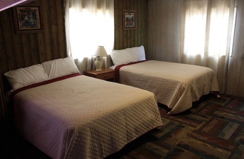 Lonergan Resort | Admiral’s Cove Resort - The log cabin