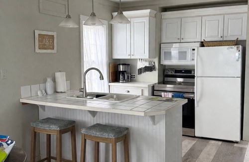 Kent Cottage | Adorable Cottage with Lakefront Views, World-class Fishing, & Effortless Escape