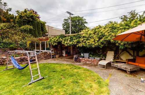 Stadium District Apartment | Adorable getaway for two with a shared backyard, kitchenette, & free WiFi