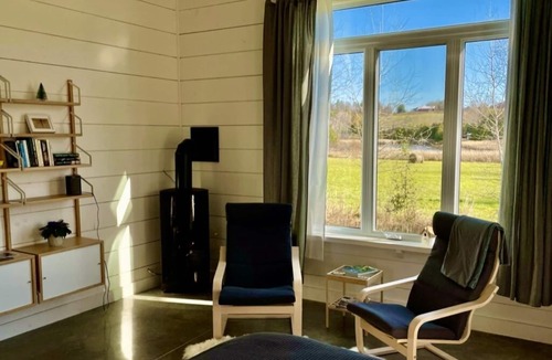 Codrington Apartment | Adorable Nordic one bedroom with fireplace & sauna