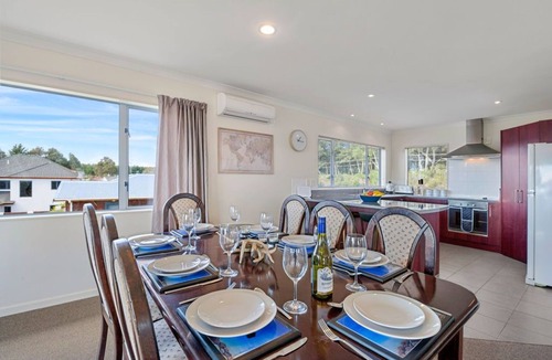 Motuoapa House | Adventure Sika - Relax on the deck with views