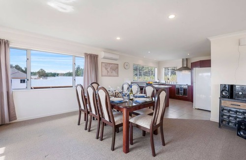 Motuoapa House | Adventure Sika - Relax on the deck with views