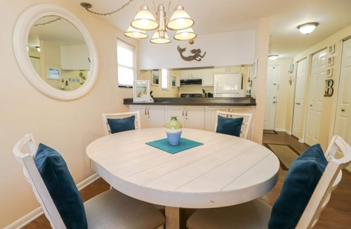 Butler Beach Condo | AFFORDABLE Escape! OCEAN VIEW, Steps to Beach, Ground Floor 1BR overlooking pool