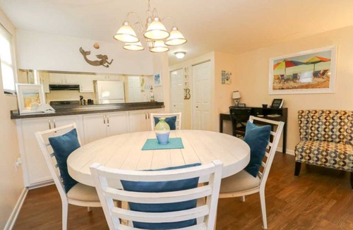 Butler Beach Condo | AFFORDABLE Escape! OCEAN VIEW, Steps to Beach, Ground Floor 1BR overlooking pool