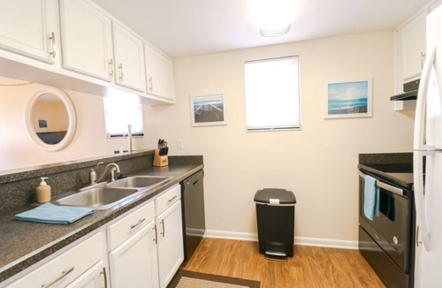 Butler Beach Condo | AFFORDABLE Escape! OCEAN VIEW, Steps to Beach, Ground Floor 1BR overlooking pool