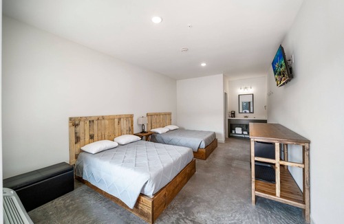 Copeland Cabin | Affordable Lodge w/Covered, Lighted, Pull Through Parking. Grills and Outdoor TV