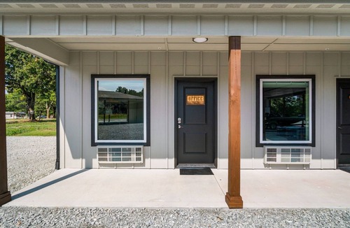 Copeland Cabin | Affordable Lodge w/Covered, Lighted, Pull Through Parking. Grills and Outdoor TV