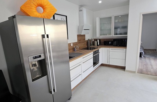 Nemours House | Air-conditioned house in the center of town on a quiet street close to all amenities.