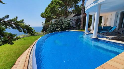 Lloret de Mar Villa | Al lado del mar "Villa Tortuga 12"