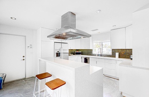 Racquet Club Estates House | Alexander in the Sun Permit# 3875