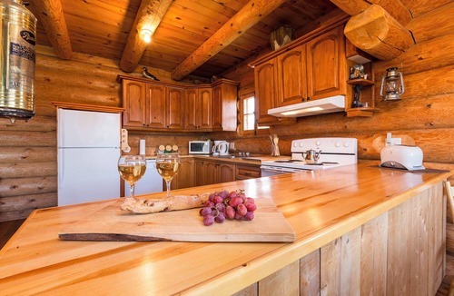 Baie-St-Paul Condo | All wood-dressed chalet