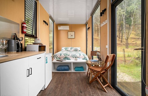 Flowerdale House | Alpaca Tiny House with Vineyard Lakeside by Tiny Away