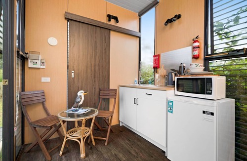 Flowerdale House | Alpaca Tiny House with Vineyard Lakeside by Tiny Away