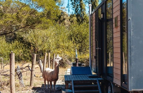 Flowerdale House | Alpaca Tiny House with Vineyard Lakeside by Tiny Away