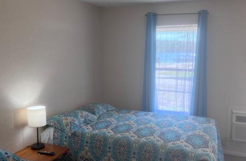 Hemphill Hotel | Alpine Lakeside Motel Room Backside