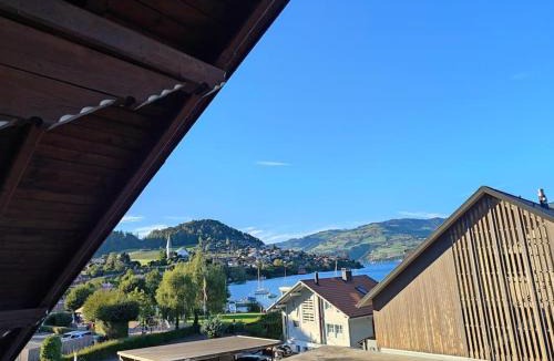 Faulensee Apartment | Am See l 15 Minuten nach Interlaken l gratis Parking