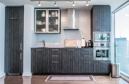 Central Waterfront Condo | Amazing 65th floor downtown condo! +Free parking.