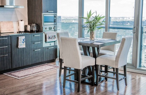 Central Waterfront Condo | Amazing 65th floor downtown condo! +Free parking.