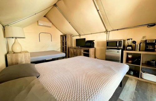 Prairie Lea House | Amazing Glamping Destination for Friends and Family: Comfortable Safari Tent on the San Marcos River near Kingsbury, Texas
