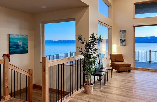 Laketown House | Amazing lakefront home with private beach, boat ramp, courts & fireplace