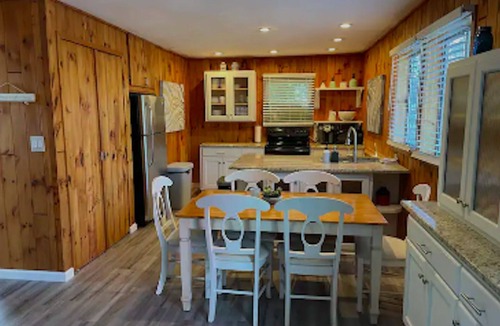 Cherry Grove House | Amazing location with private hot tub!