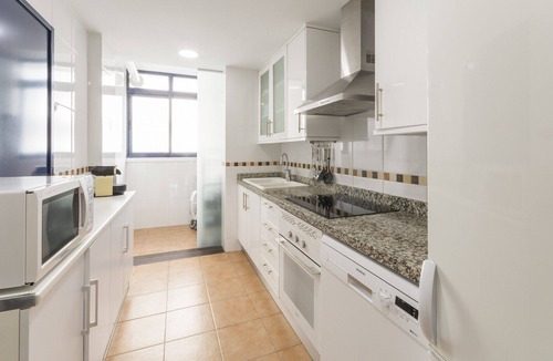 Playa de Gandia Apartment | Amazing modern style condo, wifi free, interantional channels, heating swimming pool, children's area, BBQ - only families