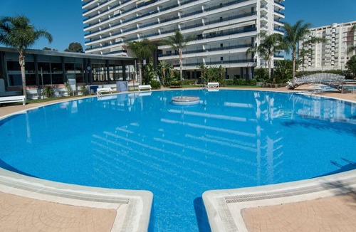Playa de Gandia Apartment | Amazing modern style condo, wifi free, interantional channels, heating swimming pool, children's area, BBQ - only families