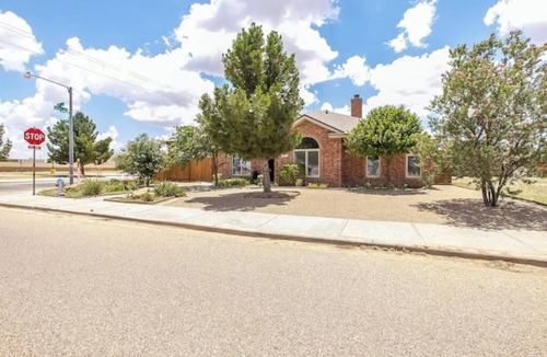 Lubbock House | Amazing patio with pergola, enclosed patio, finished out garage!