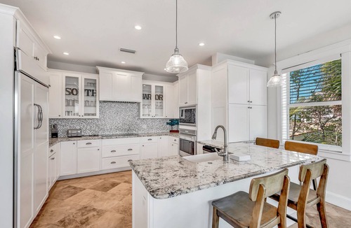 Holmes Beach House | Amazing waterfront home with pool and spa, close to beach!