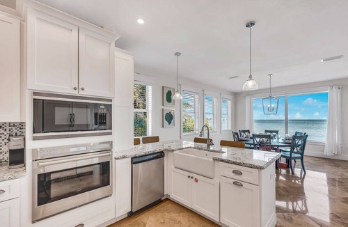 Holmes Beach House | Amazing waterfront home with pool and spa, close to beach!