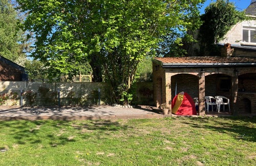 Boussois House | An old-fashioned farmhouse surrounded by animals.