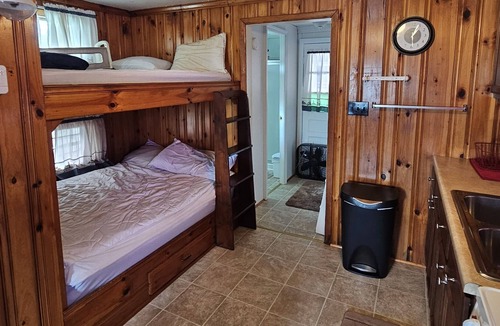 New Tazewell Boat Rental | Anchored Oasis Floating house on Norris Lake.