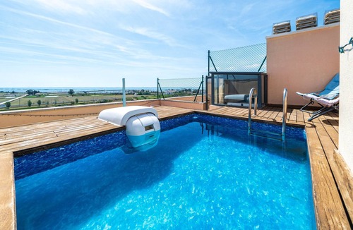 Sant Carles de la Rapita Apartment | Apartment "Ático Oscar" with Sea View, Private Pool & Wi-Fi