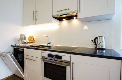 Amden Apartment | Apartment Bijou am Bach by Interhome