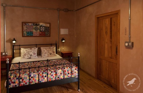 Vega del Codorno Hotel | Apartment Biosostenible Raven River Garden adapted