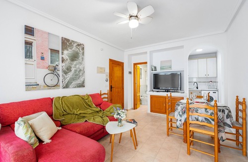 La Zenia Apartment | Apartment 'Buen Ambiente' with Shared Pool, Shared Garden and Wi-Fi
