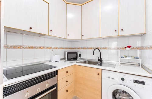 La Zenia Apartment | Apartment 'Buen Ambiente' with Shared Pool, Shared Garden and Wi-Fi