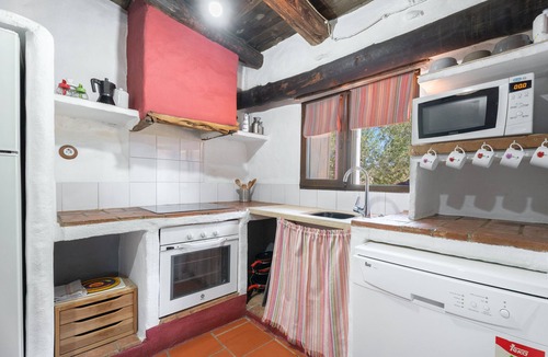 La Torre d'En Besora Apartment | Apartment 'Cau' with Mountain View, Shared Pool and Private Terrace
