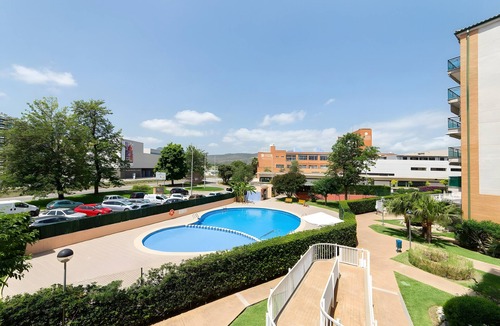 Grao de Gandia Apartment | Apartment 'Calma Mar' with Shared Pool, Wi-Fi and Air Conditioning