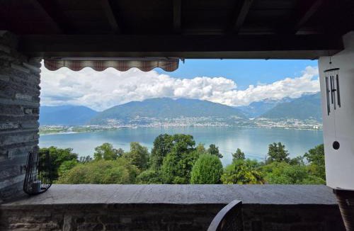 Piazzogna Apartment | Apartment Casa Melitta' Ferien mit schönem Seeblick by Interhome