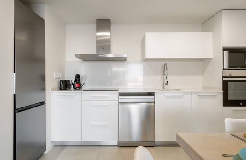 Calafell Apartment | Apartment 'Costa Dorada Perle' with Sea View, Shared Pool and Air Conditioning