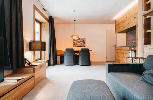 Laax Apartment | Apartment Cosy Alpine by Interhome